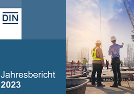 Cover des Jahresberichts mit einem Foto von 2 Bauherren auf einer Baustelle