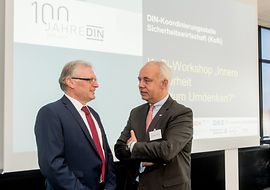 Rüdiger Marquardt, Vorstand DIN e. V. und Christoph Hampe, Bosch Sicherheitssysteme GmbH